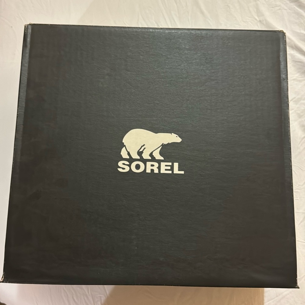 Sorel Joan of Arctic next lite strap puffy